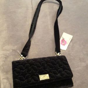 A Betsey Johnson black velvet crossbody.